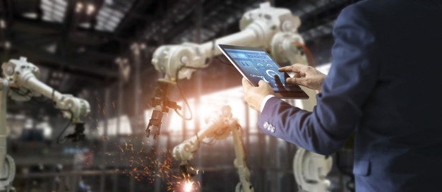Manager industrial engineer using tablet check and control autom