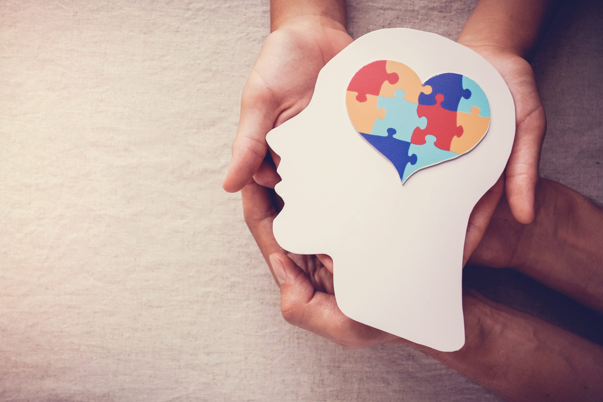 puzzle jigsaw heart on brain, mental health concept, world auti