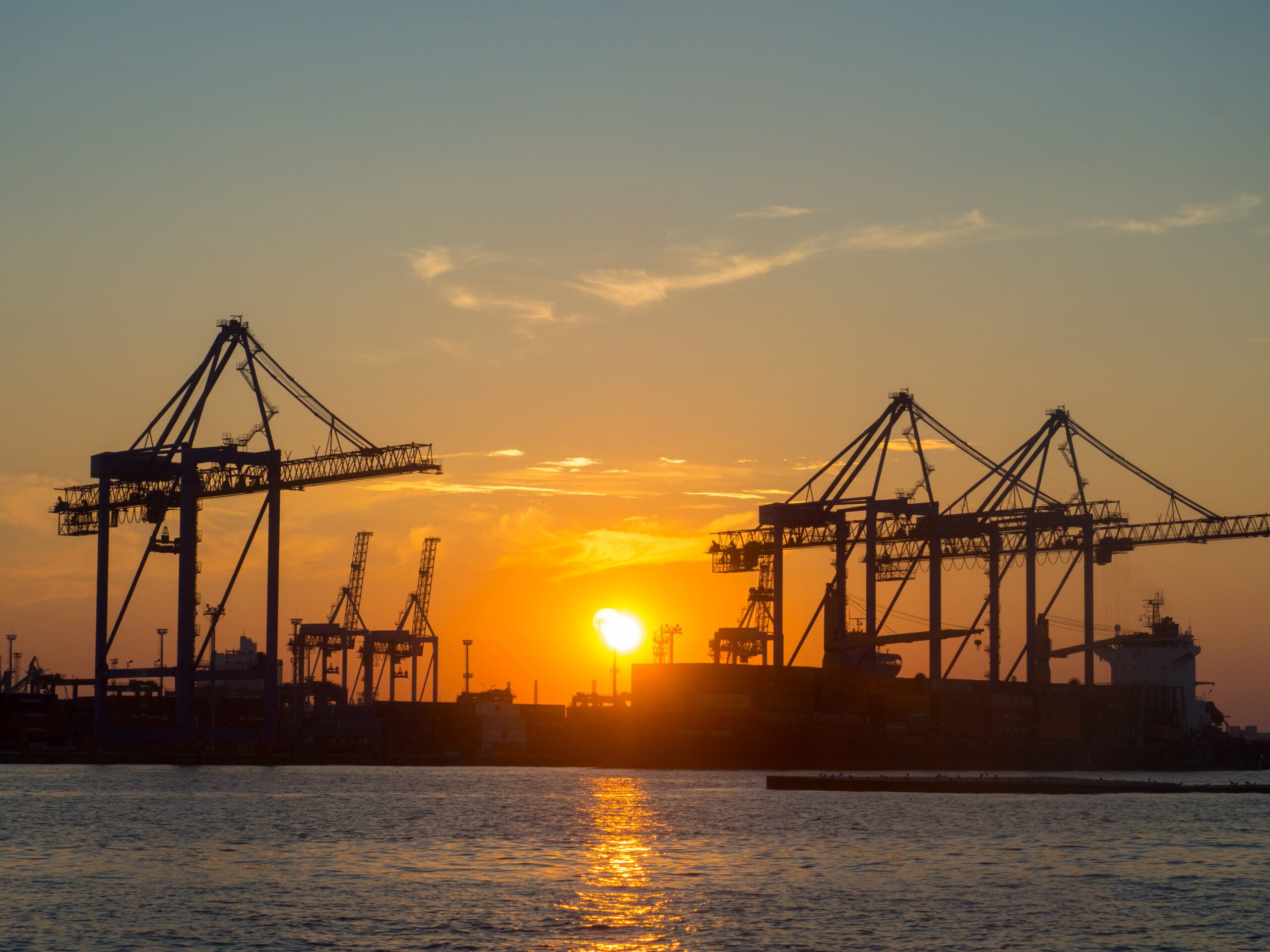 black sea port Odesa, Ukraine with a lot of cranes, cabins, boxes and tanks